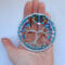 small tree of life shown in persons hand to gauge actual size of 3 inches